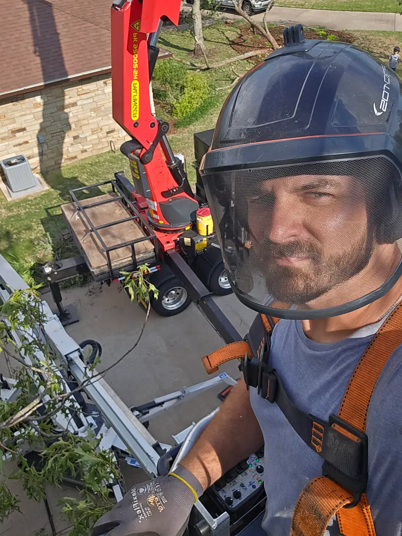 Shawn McDaniel, owner of Elite Tree Service LLC, on a job site